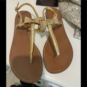 Tory Burch Gold Sandal with crystal bow detail, size 9